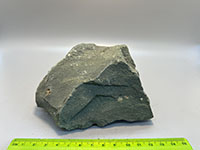 a smooth, uniform gray rock with no visible crystals